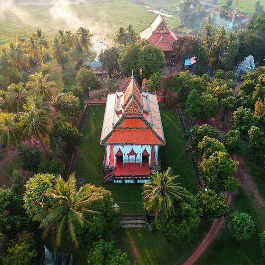 Birds eye view image of a temple in Cambodia surrounded by greenery