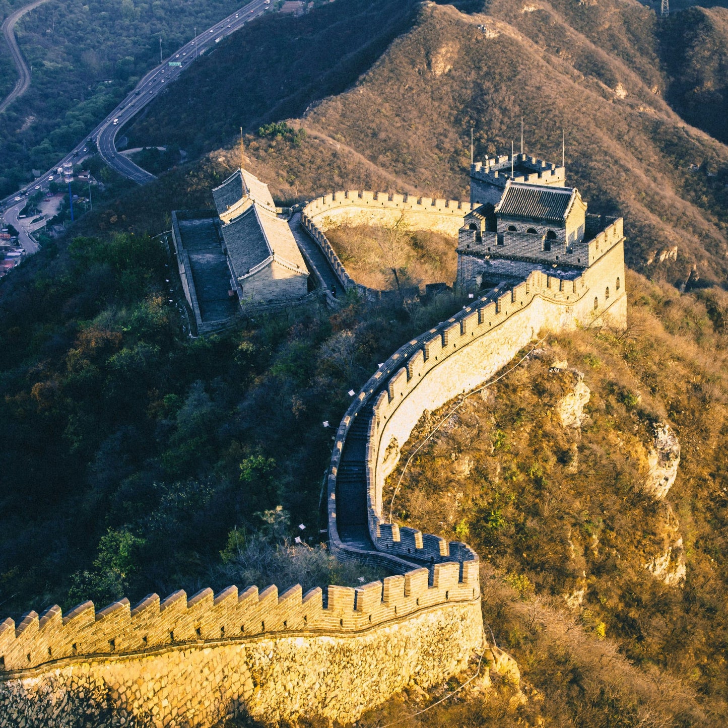 Section of the Great Wall of China with mountains in the background